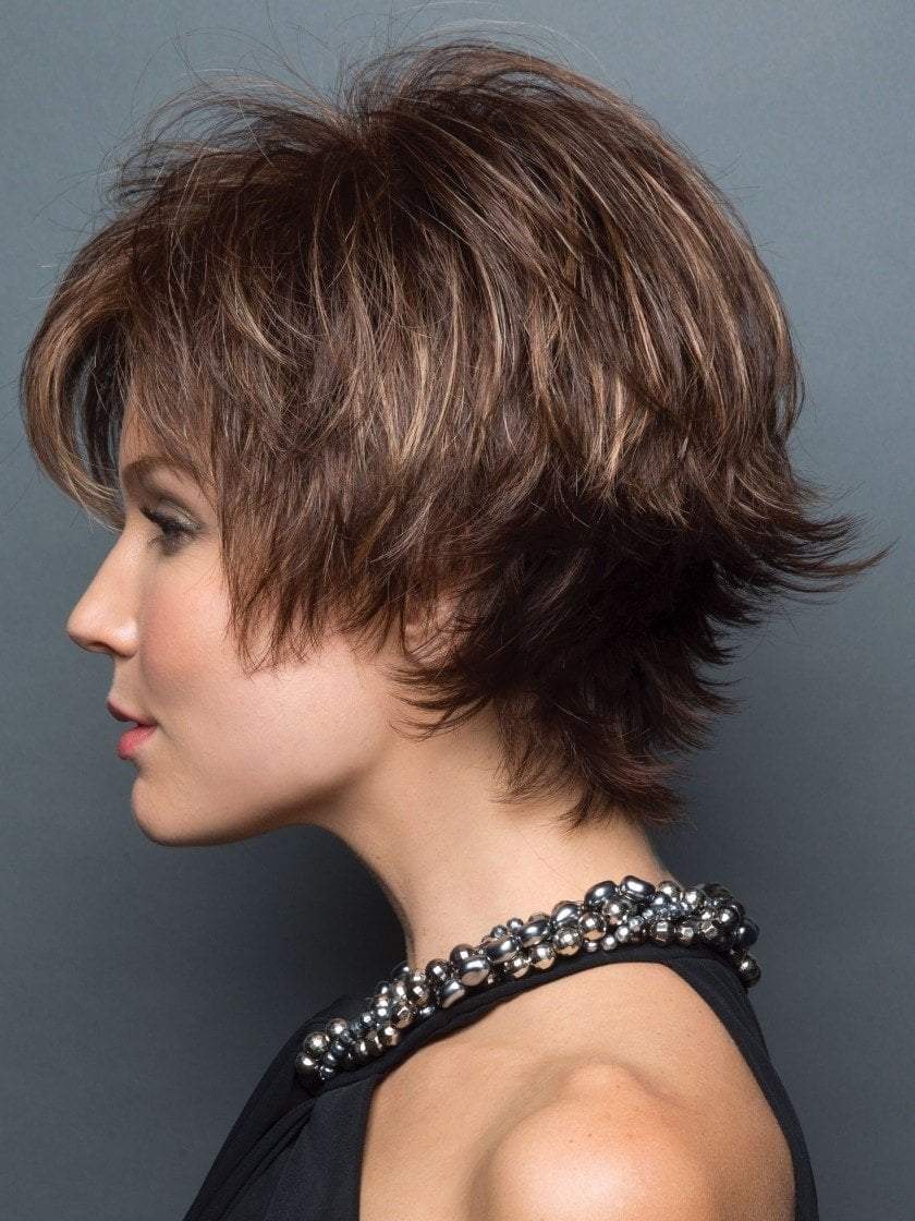 Face framing fringe, that is flattering and the tousled layering throughout adds a fun, fresh look