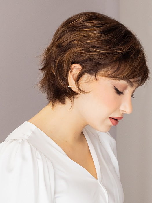 Maha is wearing the VOLTAGE ELITE by RAQUEL WELCH in color R829S+ GLAZED HAZELNUT | Rich Medium with Ginger Highlights on Top