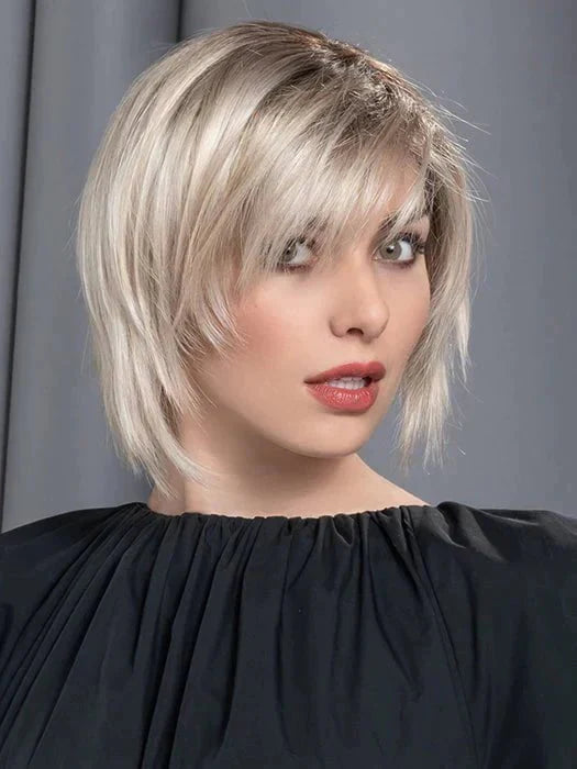 A  modern cut with an extended lace front and monofilament part