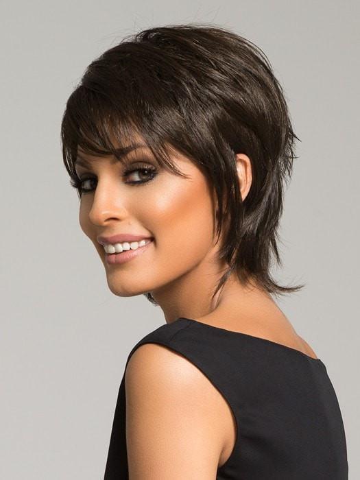 Soft bang and fringe frame the face