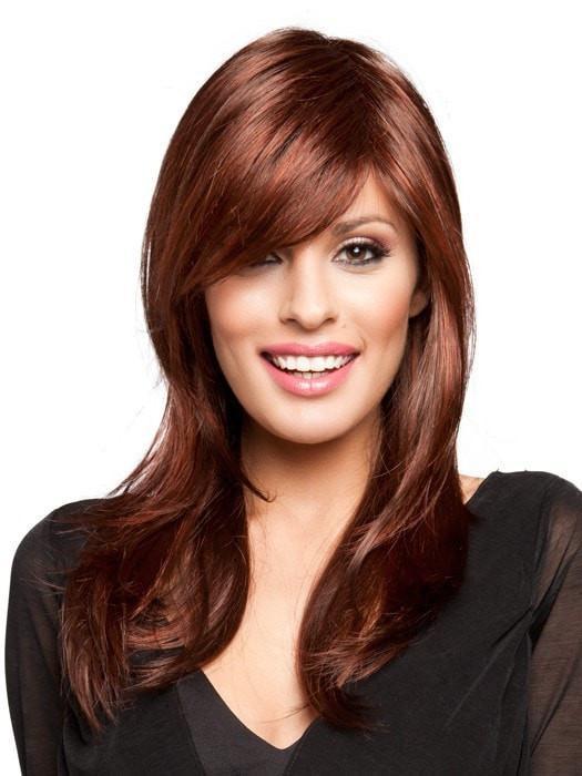 A long and layered style with a side bang and face-framing layers
