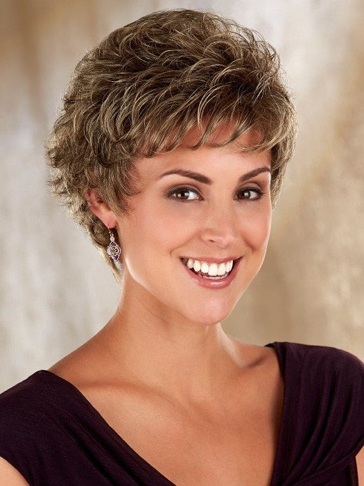 Olivia is a layered cut with crimp, curl, and texture.