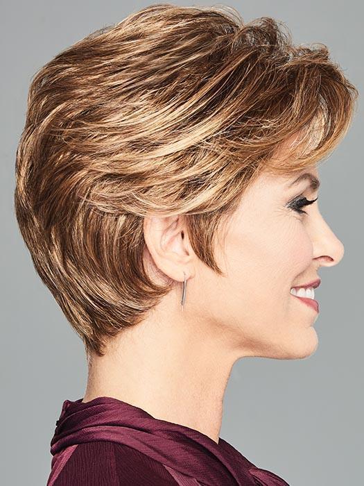 The gently waved layers can be brushed away from the face