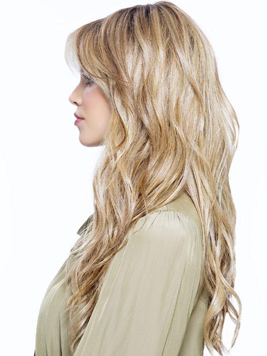 The long heat-friendly synthetic layers are accented by feathered bangs