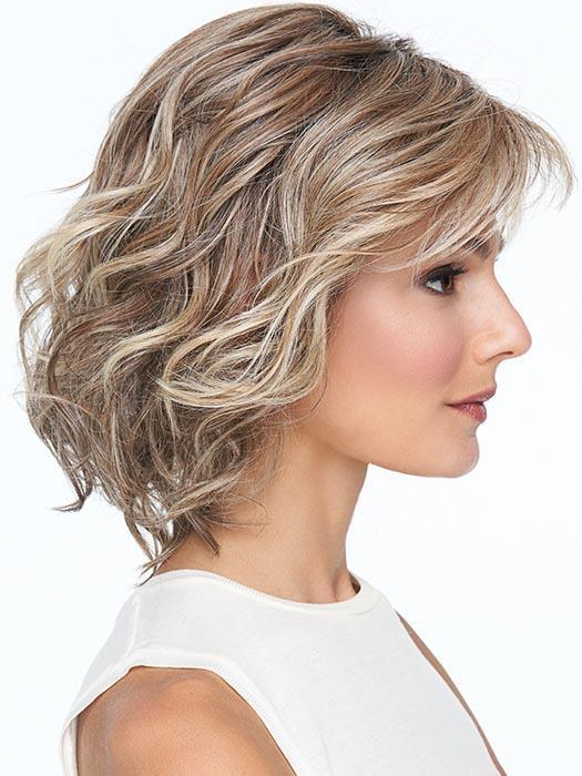 A gently waved and tousled layered bob that offers even more styling versatility with 100% hand-tied cap