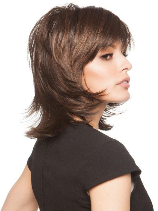 A mid-length, layered shag cut with a wispy bang